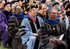 spu faculty in regalia at ivy cutting ceremony